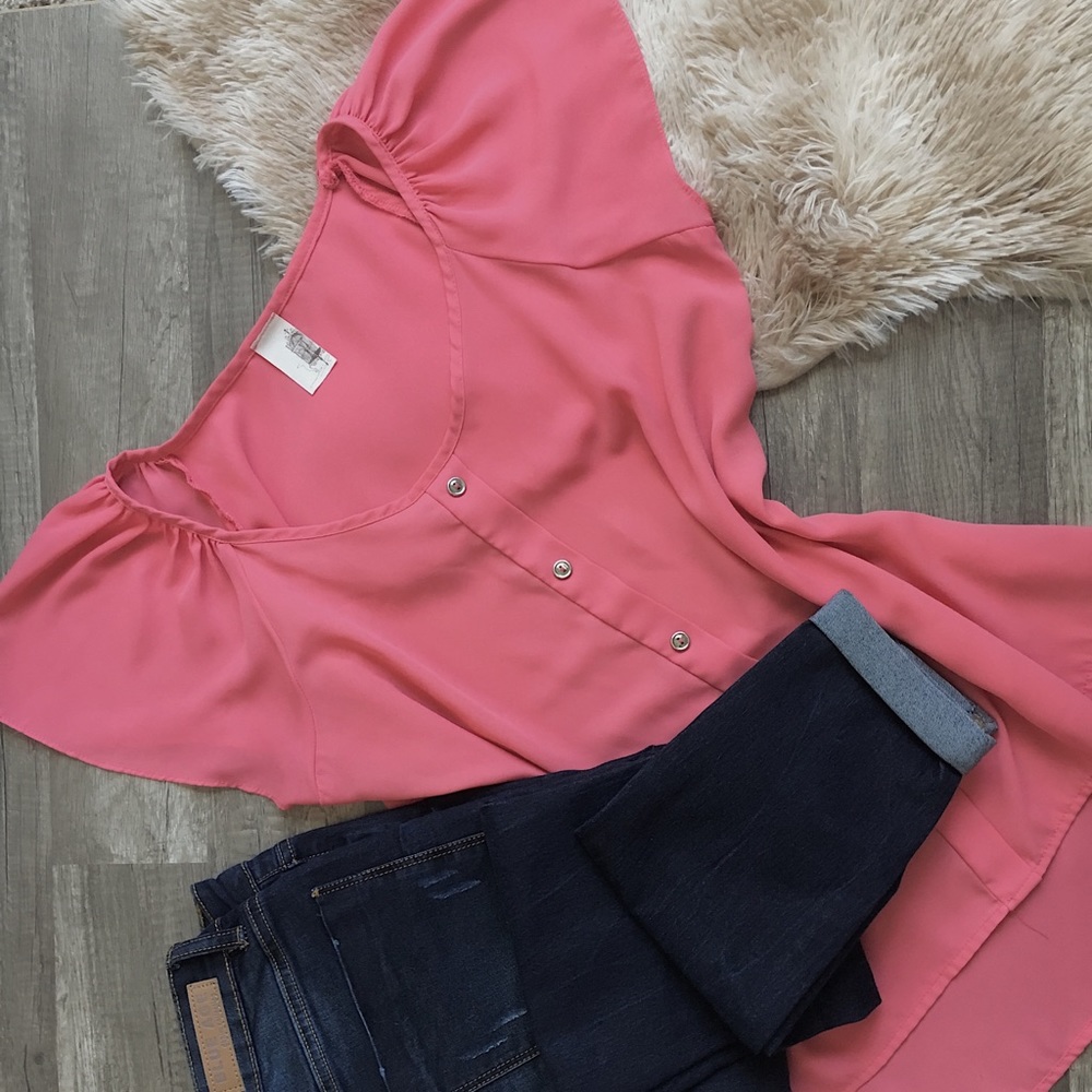 Pink blouse with flutter sleeves